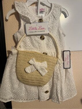 Little Lass cream straw crossbody bag with white bow